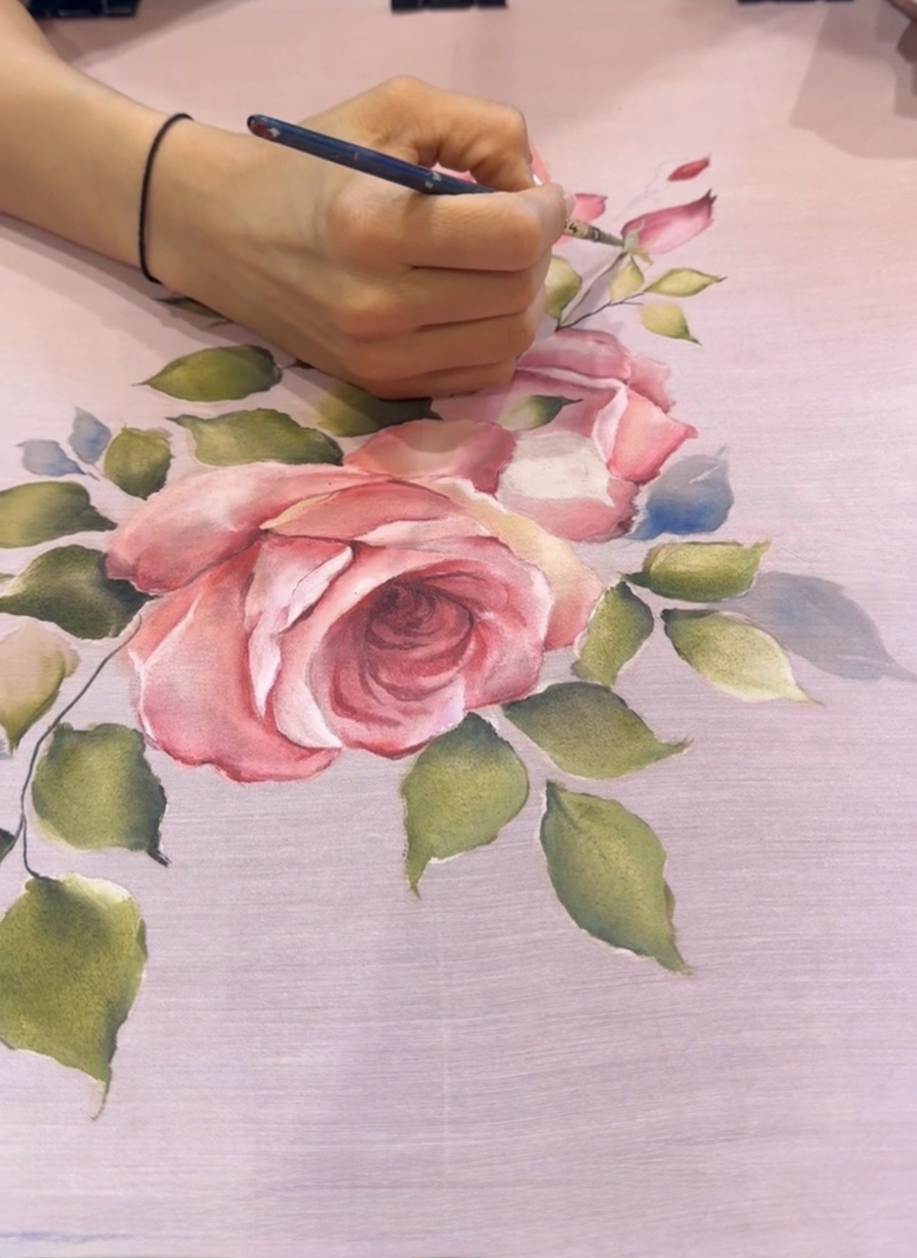 Hand-painting the artwork